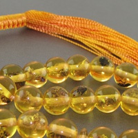 تسبیح کهربا پودری حشره ای عالی ۳۳ دانه ای