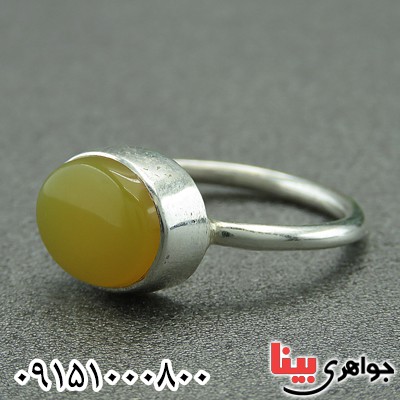 انگشتر عقیق زرد زنانه پشت بسته همراه با حرز امام جواد _کد:27977