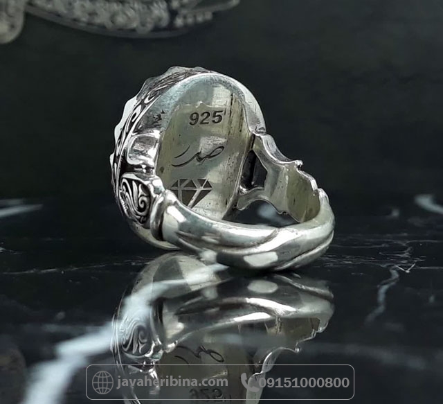 انگشتر فیروزه نیشابوری پشت بسته همراه با حرز امام جواد و تربت اثر استاد صدر _کد:35636